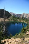 Lake Wiseman ringed by serpentine Twin Sisters Range